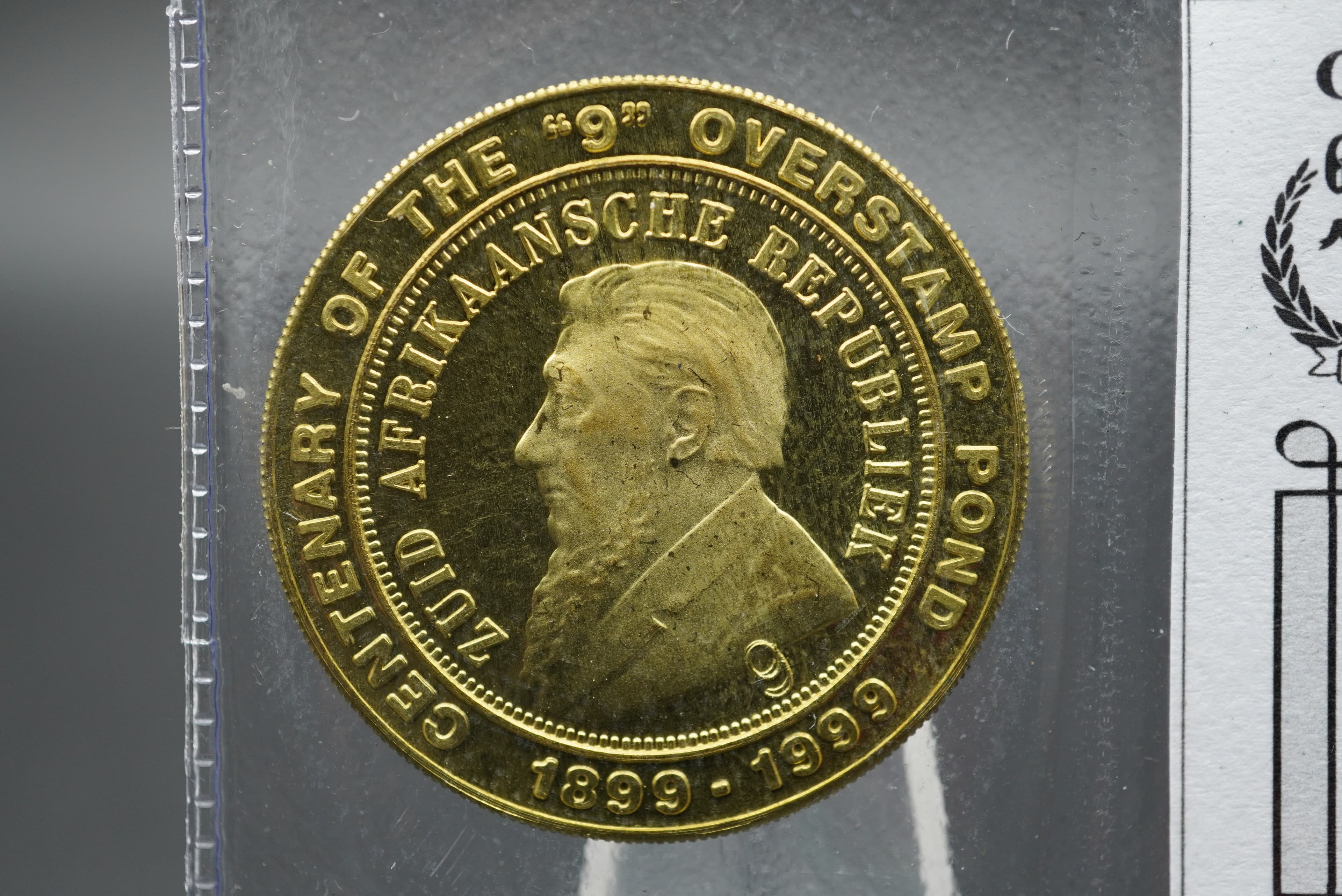 GRC solid brass replica of centenary of the '9' overstamp pond coin