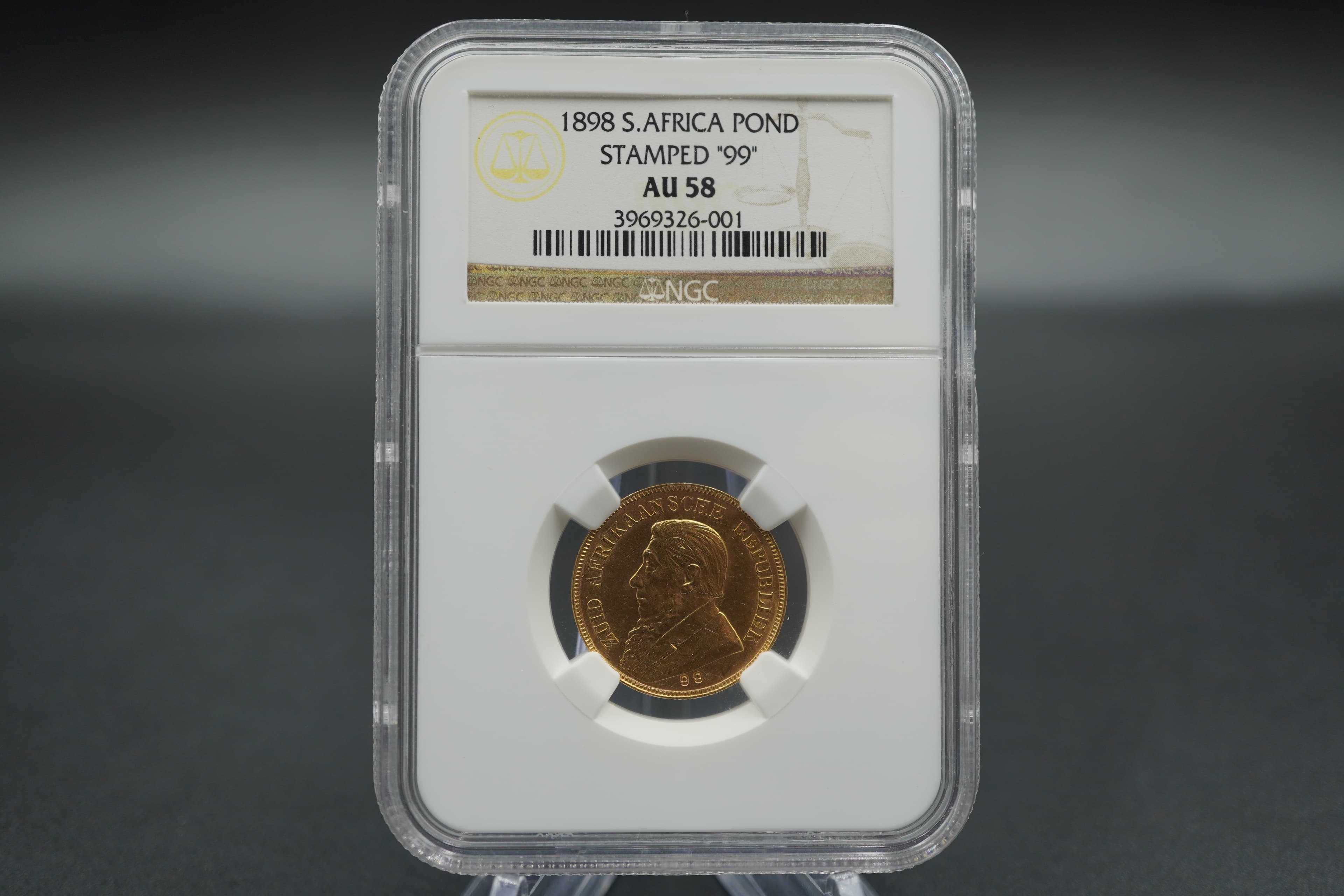 1898 ZAR Gold Pond (AU58)- Stamped 99